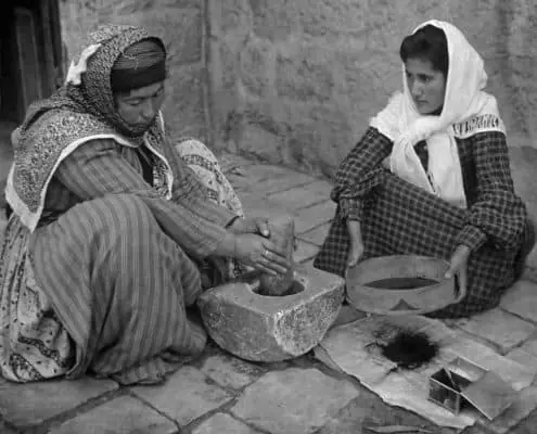 Traditional hand-grinding of coffee beans